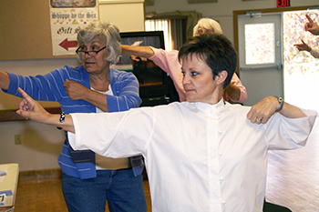 Silver Lotus students performing the Eight Brocades qigong.